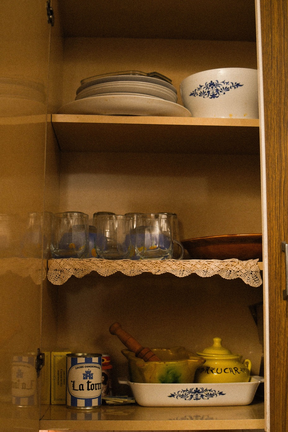 Kitchen’s cabinet interior with tableware.